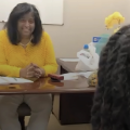 Female therapist speaking to male patient